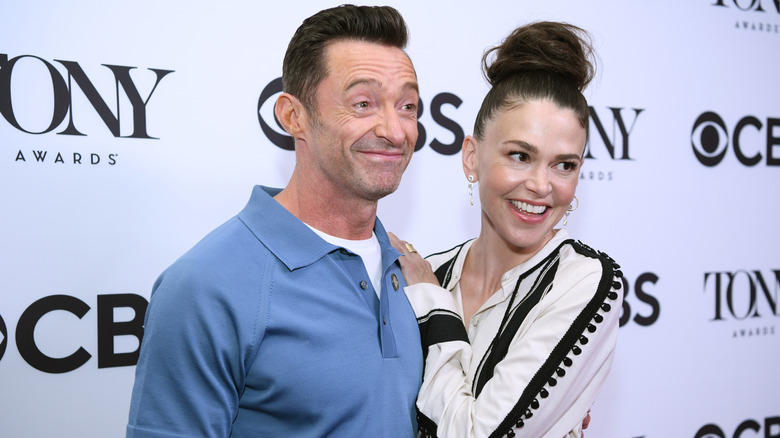 Sutton Foster and Hugh Jackman smiling for photos