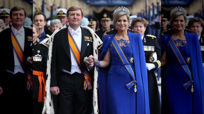 King Willem-Alexander and Queen Máxima of the Netherlands walk hand in hand on their coronation day wearing royal garb