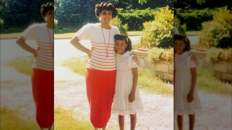 Doris and Kelly Rowland smiling for a picture circa the '80s