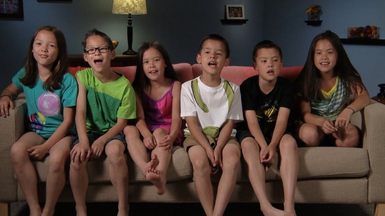 The Gosselin sextuplets sit on the sofa together