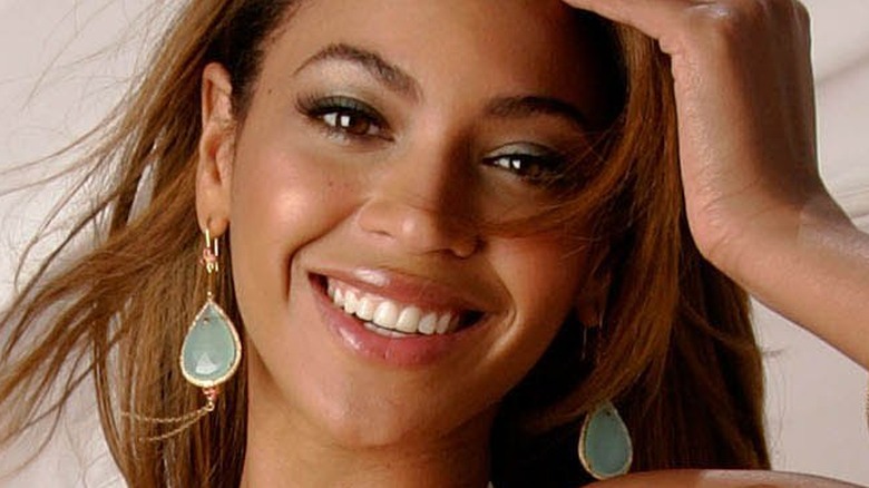 Beyonce smiling in a breeze