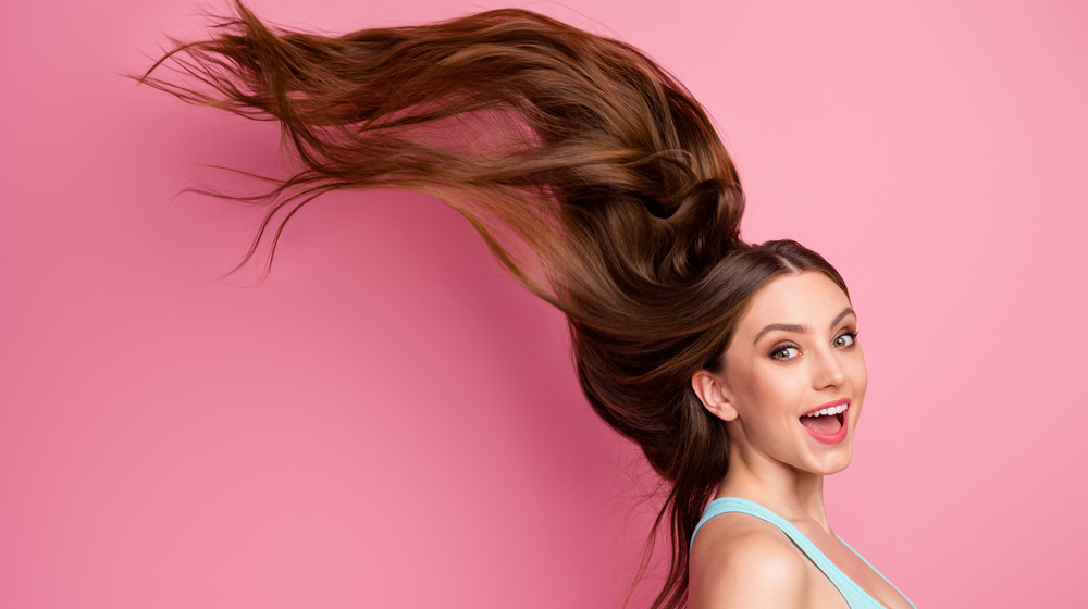 Woman with long hair smiling