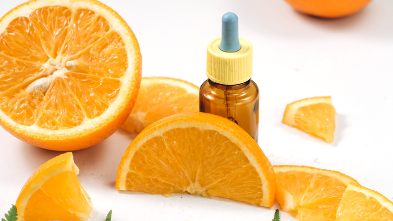 Oranges and skincare dropper