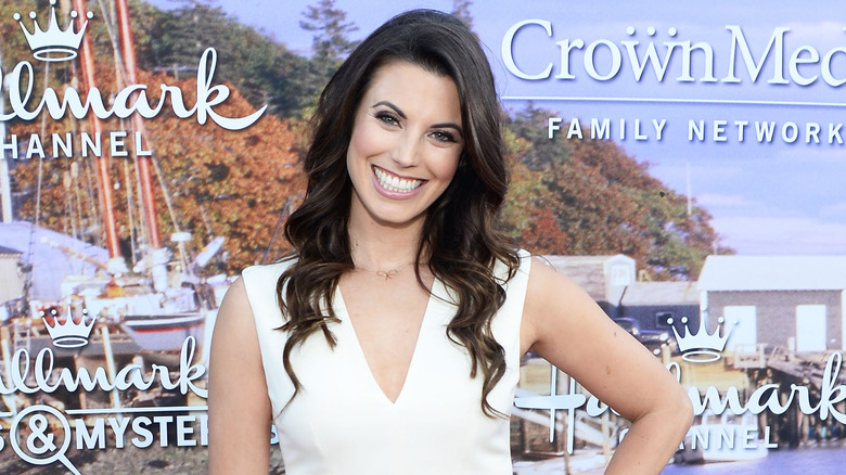 Meghan Ory posing at a Hallmark press event