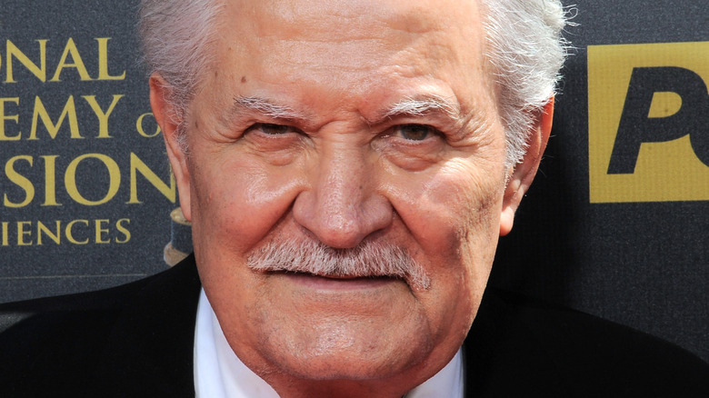 John Aniston poses on the red carpet