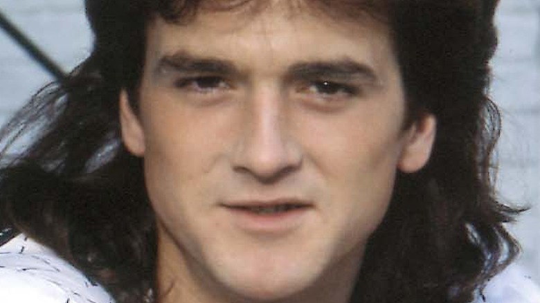 Les McKeown with long hair