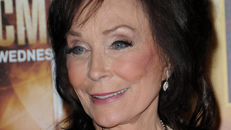 Loretta Lynn at a red carpet gala.