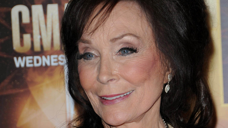 Loretta Lynn at a red carpet gala.