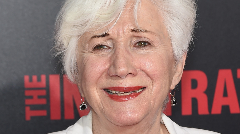 Olympia Dukakis posing on red carpet