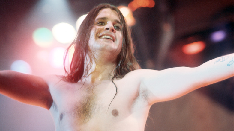 Ozzy Osbourne smiling onstage