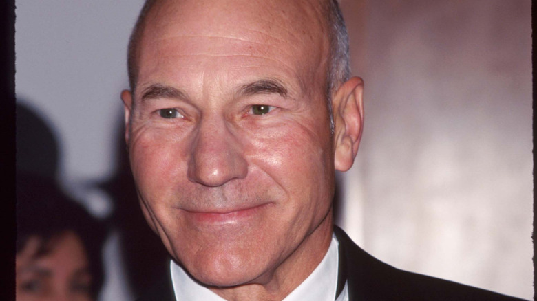 Patrick Stewart smiling on the red carpet