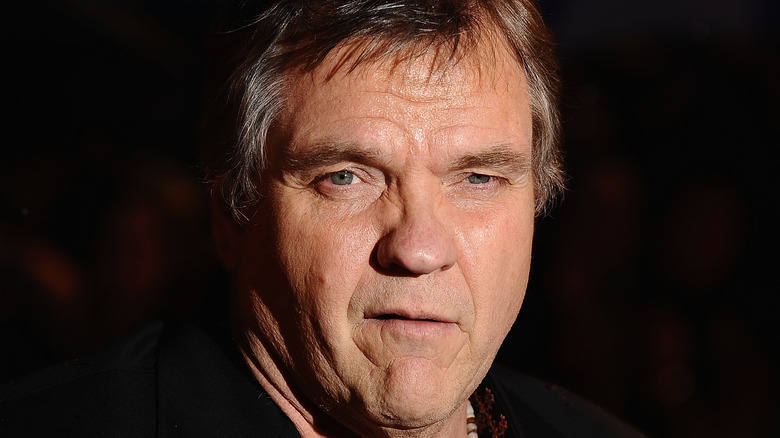 Meat Loaf poses at an event