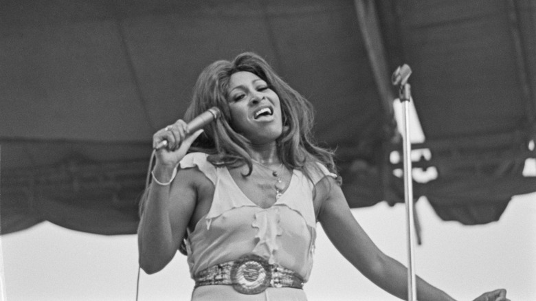 Tina Turner singing.