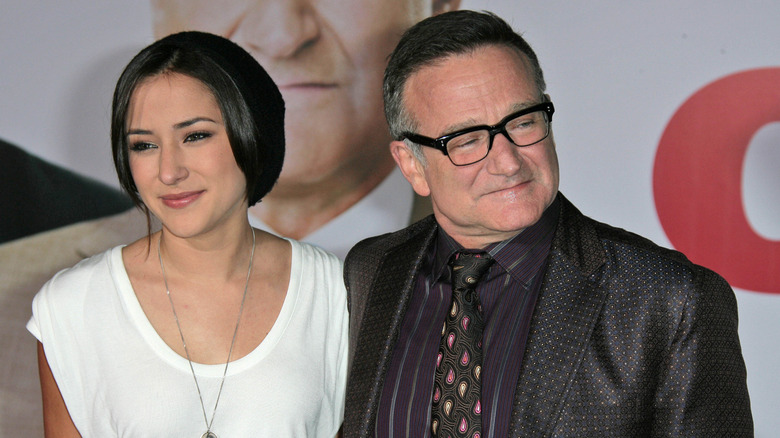Zelda Williams posing alongside her father Robin Williams