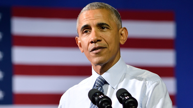 Barack Obama speaking and looking thoughtful