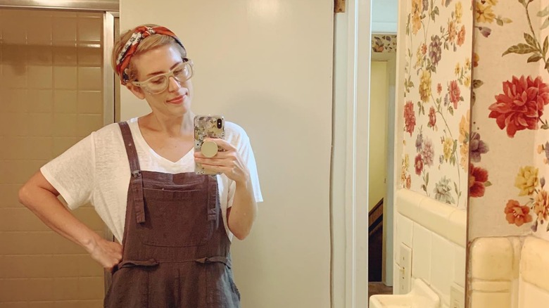 Erin Napier taking a bathroom mirror selfie