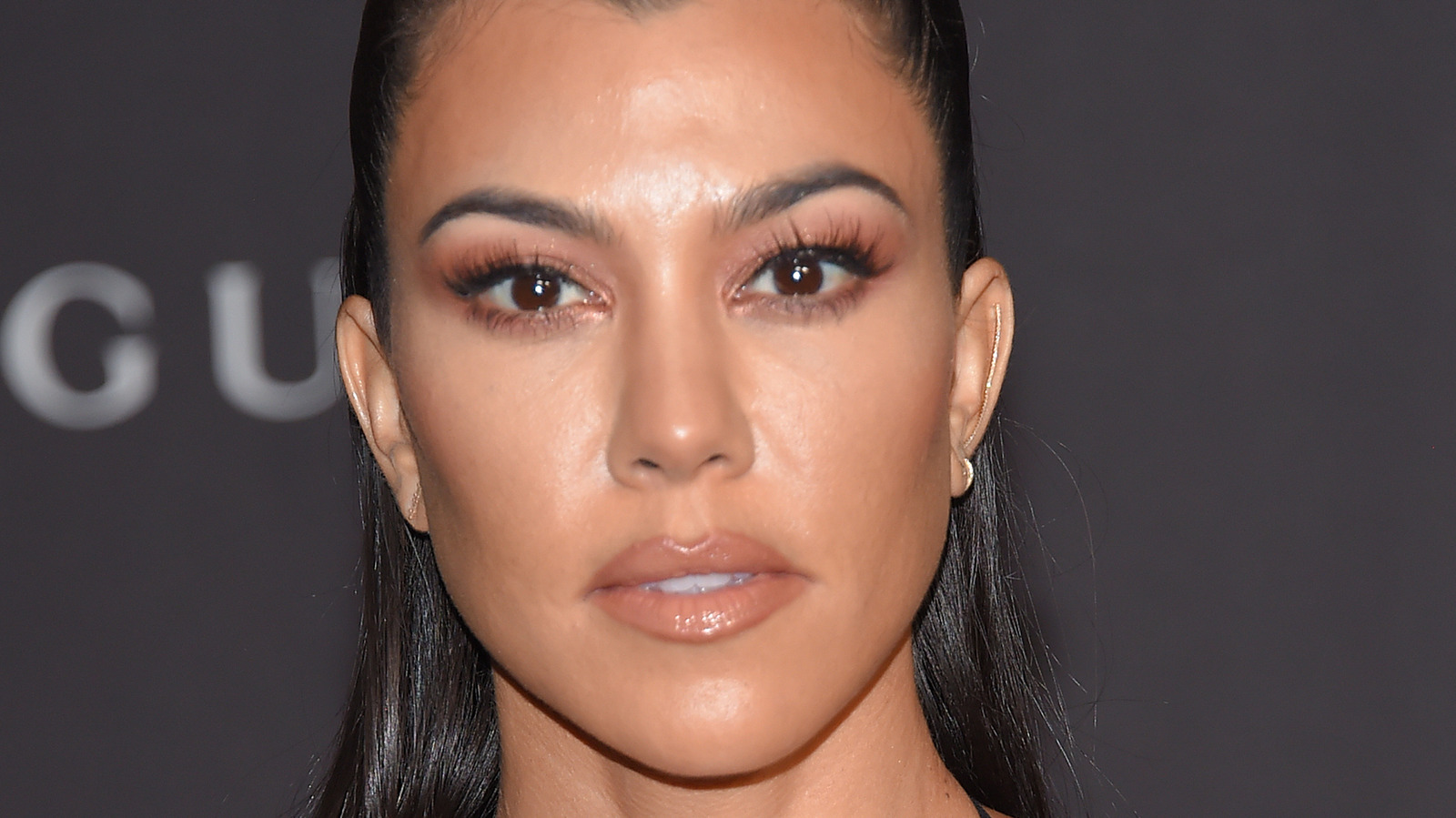 The Hidden Meaning Behind Kourtney Kardashian And Travis Barker's Body