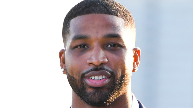 Tristan Thompson poses on the red carpet