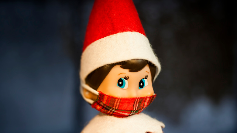 Elf on the Shelf toy with mask