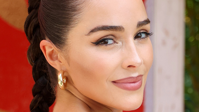 Olivia Culpo wearing hoop earrings