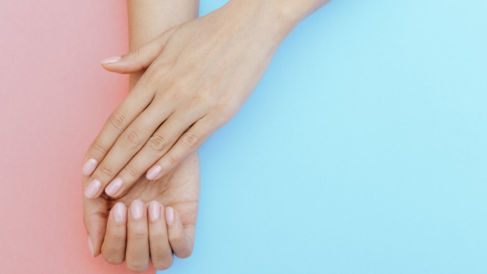 woman with manicured nails