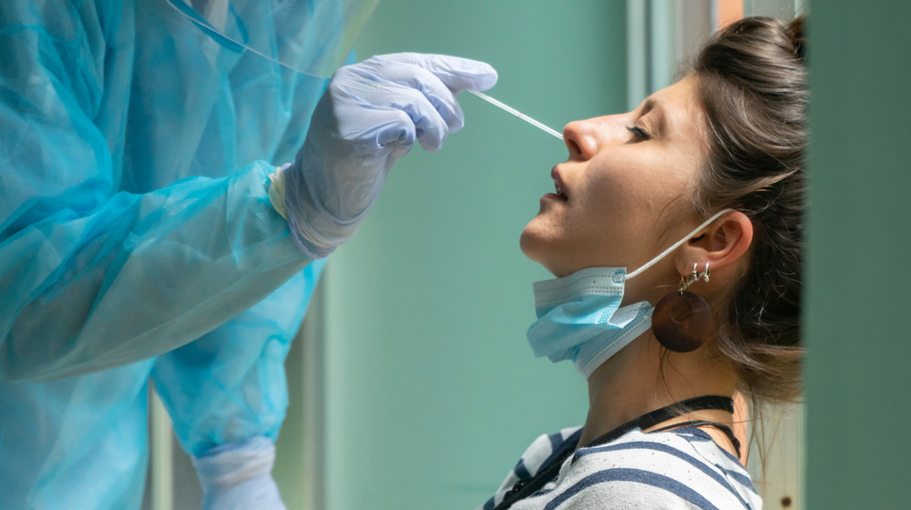 Woman undergoing a COVID test 