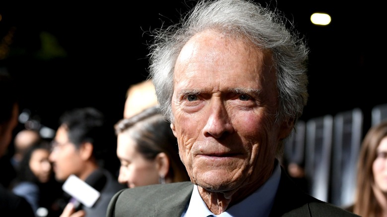 Clint Eastwood slightly smiling at a film premier in 2018