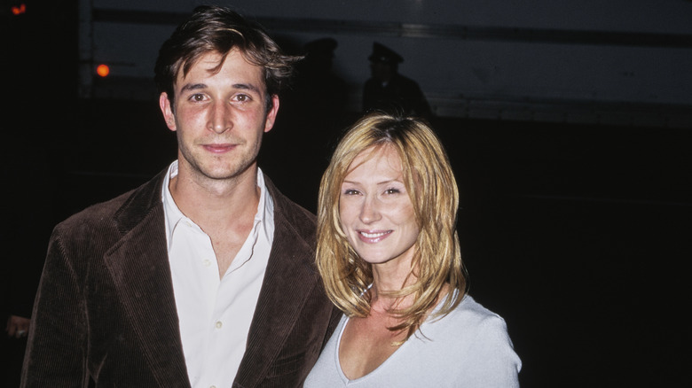 Noah Wyle and Tracy Warbin attending a premiere in 1997