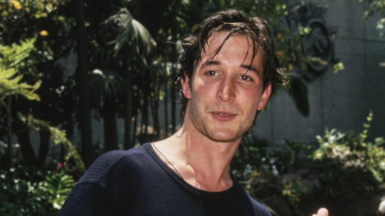 Noah Wyle smiling in the early '90s
