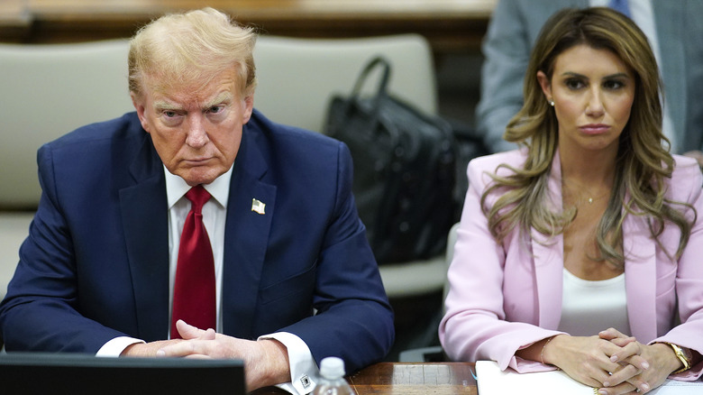 Donald Trump and Alina Habba looking serious