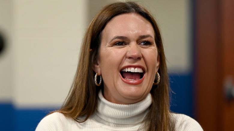 Sarah Huckabee Sanders laughing