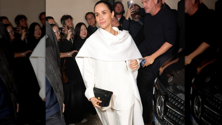 Meghan Markle at Paris Fashion Week wearing white ensemble