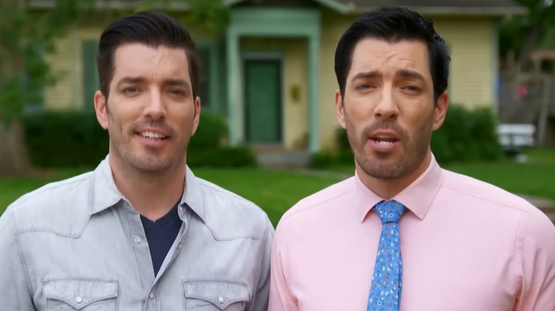 Jonathan and Drew Scott persenting "Property Brothers"