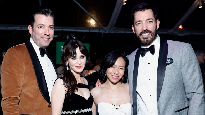 Jonathan Scott, Zooey Deschanel, Linda Phan, and Drew Scott photographed in 2023
