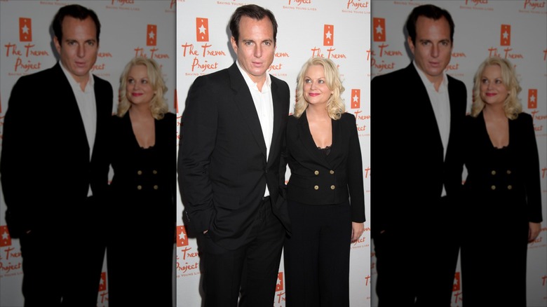 Will Arnett and Amy Poehler standing together on red carpet