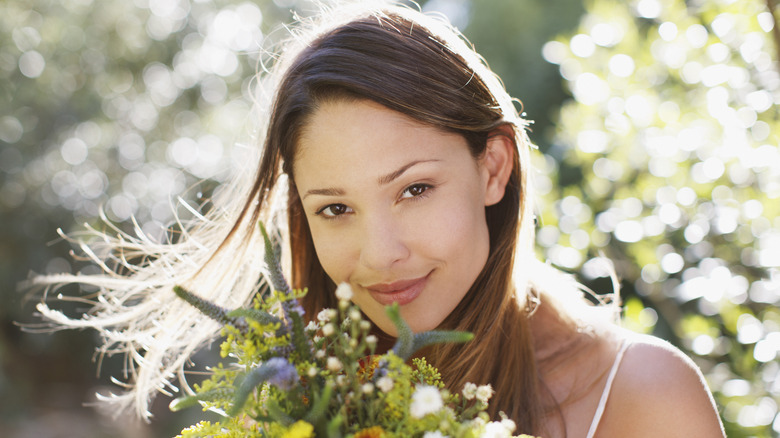 Woman holding flowers