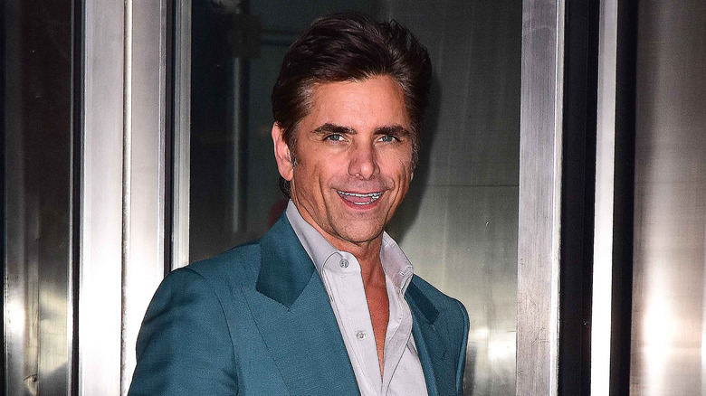 John Stamos smiling 