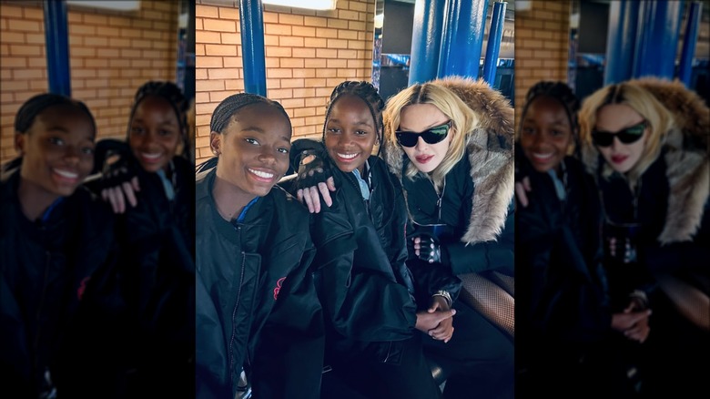 Estere and Stella Ciccone sitting with Madonna