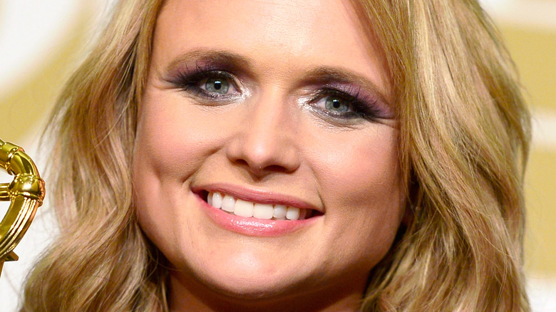 Miranda Lambert smiles on the red carpet