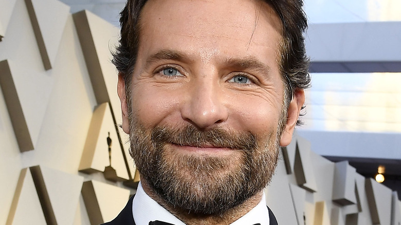 Bradley Cooper poses on the red carpet