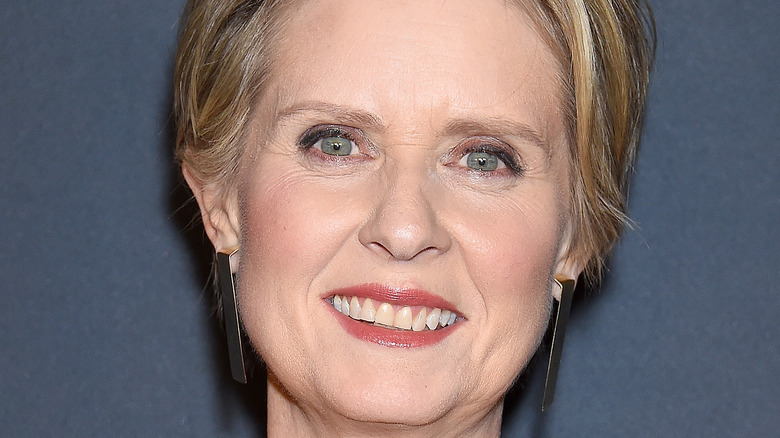 Cynthia Nixon smiling on the red carpet