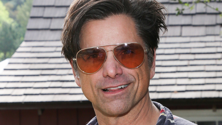 John Stamos pointing