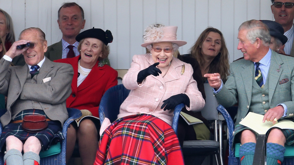 Queen Elizabeth sitting with Prince charles