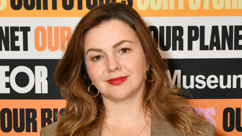 Amber Tamblyn smiling at event