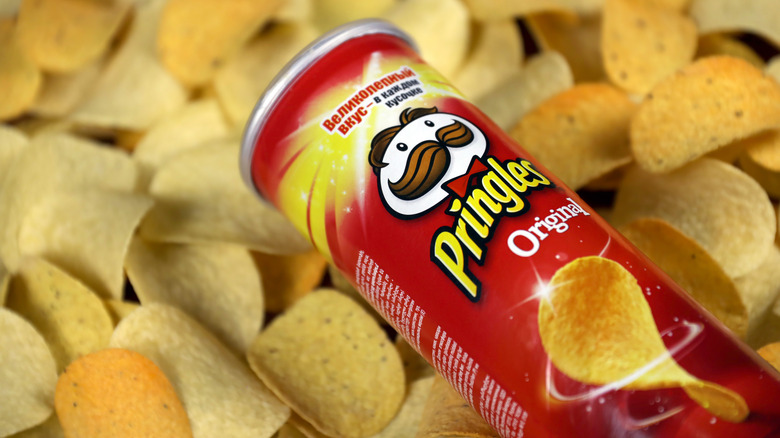 A Pringles can on a bed of Pringles 