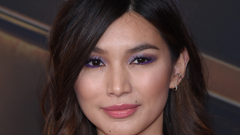 Gemma Chan walking a red carpet