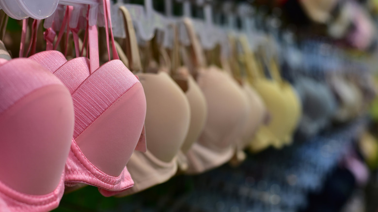 Bras hanging in a store