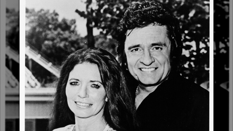 A black-and-white photo of June Carter Cash and Johnny Cash
