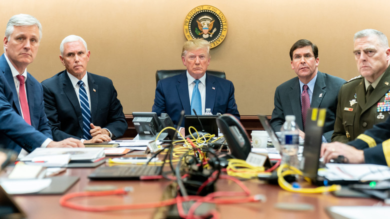 Donald Trump seated in the situation room