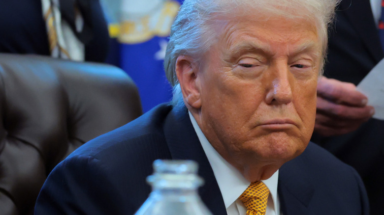 Donald Trump looking sleepy and bored